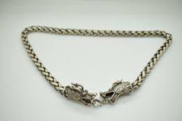 Chinese white metal necklace with dragon head decoration, length 68cm