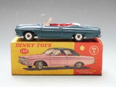 Dinky Toys diecast model Plymouth Fury Convertible with blue body, white hood and red interior, 137,