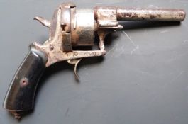 Pinfire 8-shot double action percussion hammer action revolver with engraved frame, shaped wooden