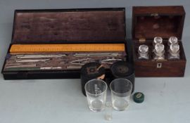 19thC rosewood cased cut glass apothecary bottles, two leather cased glass measures and a cased