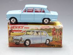 Dinky Toys diecast model Triumph 1300 with pale blue body and red interior, 162, in original box.