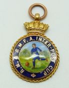 A  9ct gold and enamel RN & RMFA Inter-port Cup football medal, 10.2g