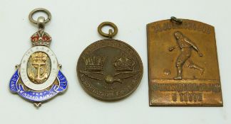 Hallmarked silver and enamel football medal marked The RNST Football Challenge Cup Grand Fleet and