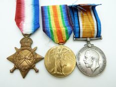 British Army WWI medals comprising 1914/1915 Star, War Medal and Victory Medal named to 124007