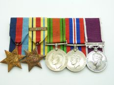 British Army WWII medals comprising 1939/1945 Star, Africa Star with clasp for 8th Army, Defence