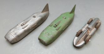 Three Dinky Toys diecast model racing cars comprising Captain G.E.T Eyston's Thunderbolt racing cars