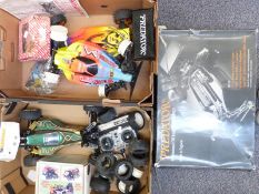 Three Tenth Technology Predator remote control cars, one with original box, together with a large