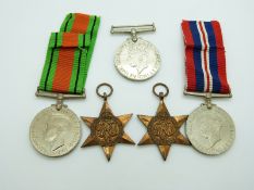 British Forces WWII medals comprising 1939/1945 Star, France & Italy Star, Defence Medal and two War
