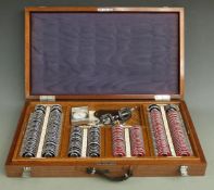 Cased set of optician's trial lenses in oak tray, with spectacles / holders marked Clement Clarke
