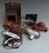 Vintage cameras to include plate camera with brass fittings, Balda folding camera, Arette C and