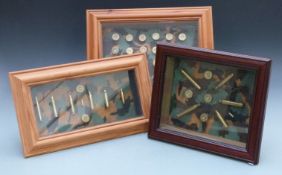 Three framed displays of shotgun and rifle cartridges, largest 38x33cm.