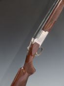 Cased Browning 525 12 bore over and under ejector shotgun with engraved lock, trigger guard and