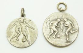 Two football medals, one with 800 grade silver mark with two players in relief to front and
