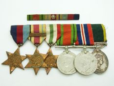 British Army WWII medals comprising 1939/1945 Star, Africa Star, Italy Star with 8th Army clasp,