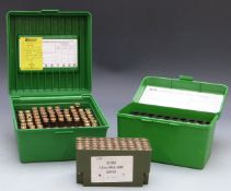 One-hundred-and-thirty-six .308 empty brass cases, in Case-Guard carry cases.