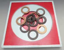 Vintage quoits board with original rubber throwing hoops, 48x48cm.