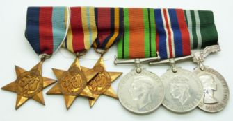British Army WWII medals comprising 1939/1945 Star, Africa Star, Burma Star, Defence Medal, War