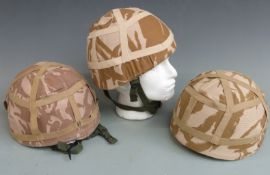British Forces three modern helmets with desert camouflage covers