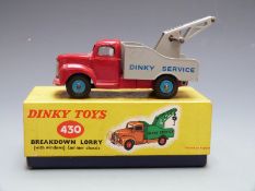 Dinky Toys diecast model Breakdown Lorry with red body, grey bed and crane, blue hubs and Dinky
