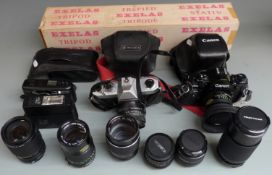Cameras and acessories to include Canon A-1 with Canon 50mm 1:1.8, 35-105mm 1:3.5-4.5, 135mm 1:3.5