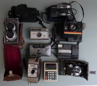 Cameras to include Photoina Reflex TLR, Polaroid, Kodak disc camera, Colorshot Specto 88 cine