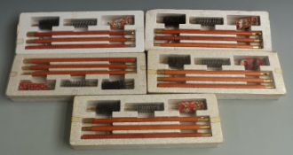 Five 12 bore shotgun cleaning kits, all in original packaging.