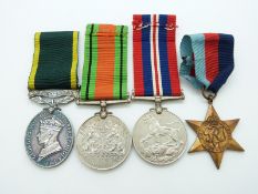 British Army WWII medals comprising 1939/1945 Star, Defence Medal, War Medal and Territorial
