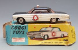 Corgi Toys diecast model Oldsmobile Sheriff Car with black and white body and 'County Sheriff'