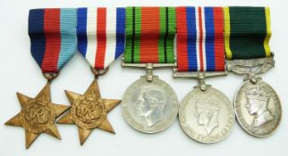 British Army WWII medals comprising 1939/1945 Star, France & Germany Star, Defence Medal, War