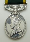 British Army Territorial Efficiency Medal (George VI) named to 865567 Gunner R Nolan, Royal