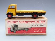 Dinky Supertoys Guy Flat Truck with yellow cab and bed, black chassis and red hubs, 512, in original