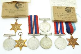 British Forces WWII medals comprising 1939/1945 Star, Atlantic Star and War Medal with box addressed