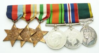 British Army WWII medals comprising 1939/1945 Star, Africa Star, Italy Star, Defence Medal, War