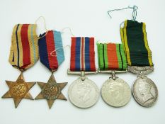 British Army WWII medals comprising 1939/1945 Star, Africa Star, Defence Medal, War Medal and
