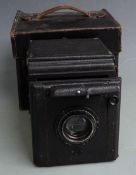 Butcher's Popular Pressman plate vintage reflex camera in case with film holders etc