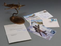 WWII brass trench art Spitfire with revolving propeller, on stand, height 15cm, with signed letter