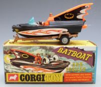 Corgi Toys model Batboat and Trailer with black and red body, flame decals, Batman and Robin figures