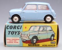 Corgi Toys diecast model Morris Mini-Minor with maroon body and lemon interior, 226, in original