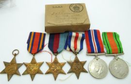 British Army WWII boxed medals comprising 1939/1945 Star, France & Germany Star, Africa Star,
