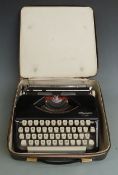 Olympia Splendid 66 typewriter in carry case