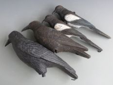 Four plastic magpie and crow decoys