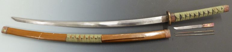 Japanese shin gunto offices sword with 67cm curved blade, in brown painted scabbard, circa WWII