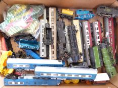 Twenty-eight Tri-ang 00 gauge locomotives, coaches, wagons and tankers together with various