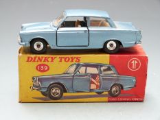 Dinky Toys diecast model Ford Consul Cortina with metallic blue body and beige interior, 139, in