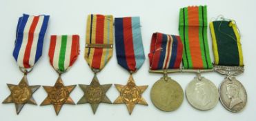 British Army WWII medals comprising 1939/1945 Star, France & Germany Star, Africa Star with clasp