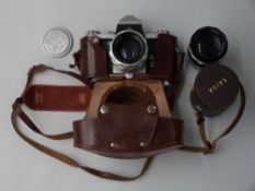 Praktica IV SLR camera with Carl Zeiss Biator 2/58 and Saiga f3.5 135mm lenses