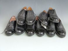 Five pairs of military shoes, appear to be size 11