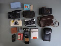 Vintage cameras and accessories to include Olympus Trip 35, Ilford Advocate, Kodak folding camera