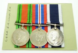 Royal Navy WWII medals comprising Defence Medal, War Medal and Long Service & Good Conduct Medal