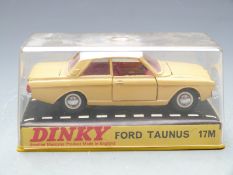Dinky Toys diecast model Ford Taurus with yellow body, white roof and red interior, 17M, in original